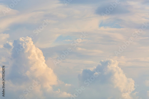 Cumulus fluffy clouds in sunny morning. Nature atmosphere background