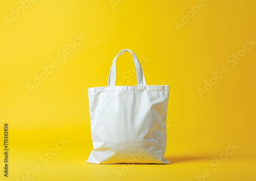 White Tote bag on isolated yellow background