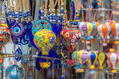 Cappadocia souvenir or gift concept. Handmade ceramics souvenirs in form of colorful hot air balloon selling in gift shop in Goreme. Kaiseri  Turkey  Turkiye 