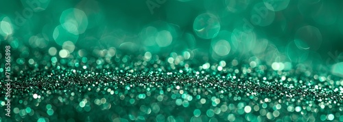Abstract shiny green glitter background. Emerald green glitter wide horizontal background photo