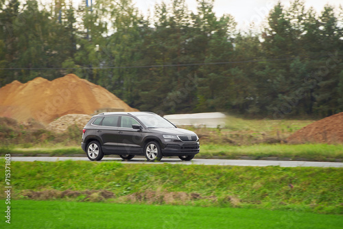 A hybrid SUV car that combines power and elegance for family travel and business work isolated on a natural background.