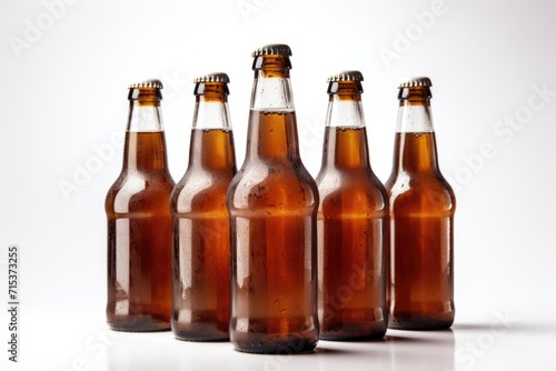 Cold beer bottles with water drops and old opener
