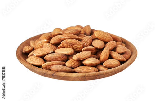 pile of peeled raw almond nut seed isolated on white background in wood bowl