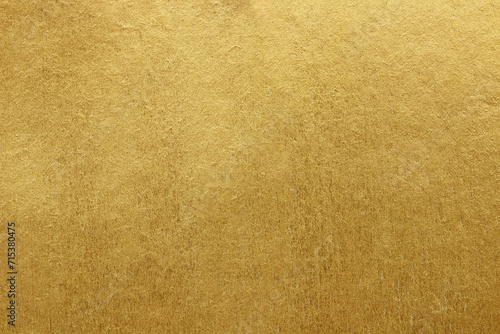 Gold paper texture background. gold wall background