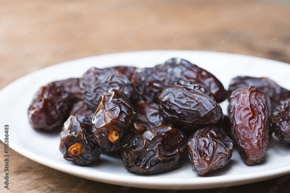 Medjool dates or Dates are brown, dried fruits that can be eaten with the skin on and have a very sweet taste. Medjool dates or Dates are brown, dried fruits that can be eaten with the skin on and have a very sweet taste.