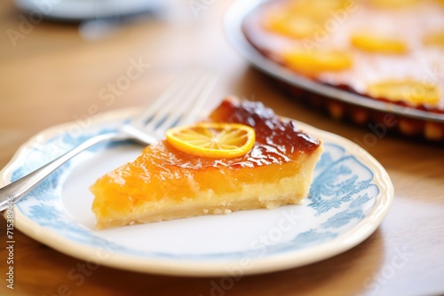 close-up of tarte au citron slice on a dessert fork photo