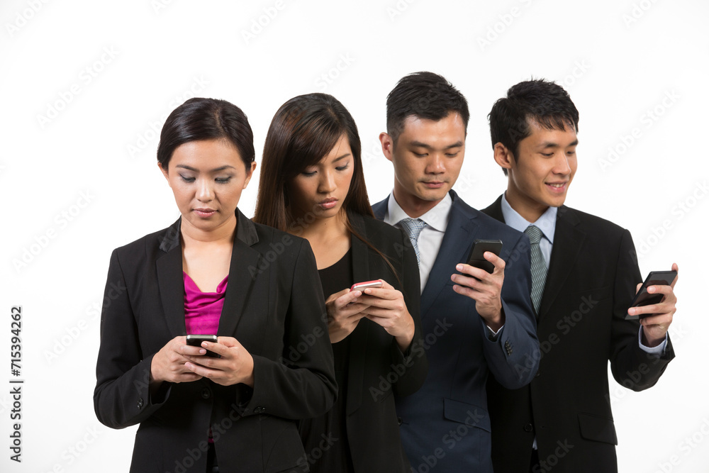 Asian business team using smartphones. Asian business team using smartphones.