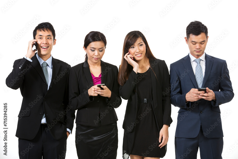 Asian business team using smartphones. Asian business team using smartphones.
