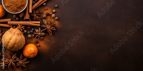 Fall leaves and spices on black background, Background of mixed nuts. hazelnuts, walnuts, cedar