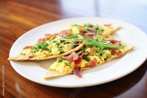 flatbread pizza with scrambled eggs, bacon, and chives