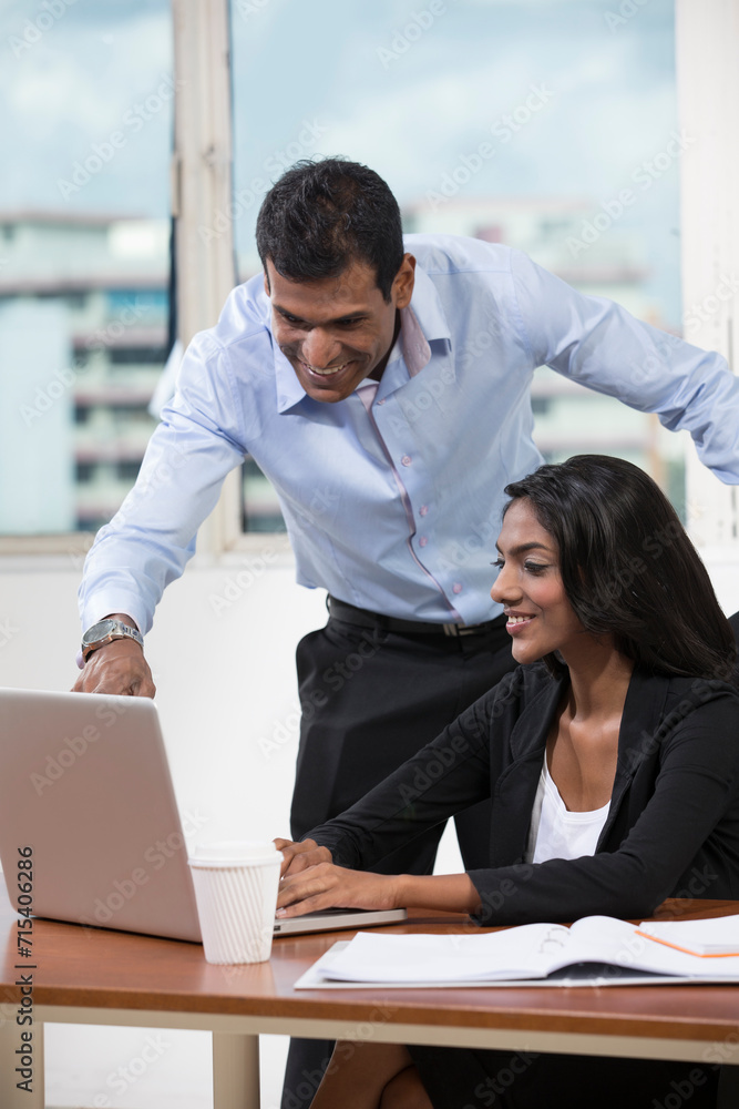 Indian business people having working together. Indian business people having working together.