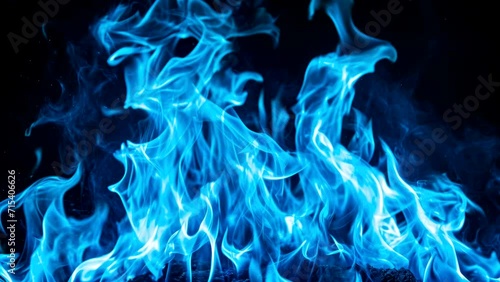 blue fire flame on dark background, butane gas video background looping photo