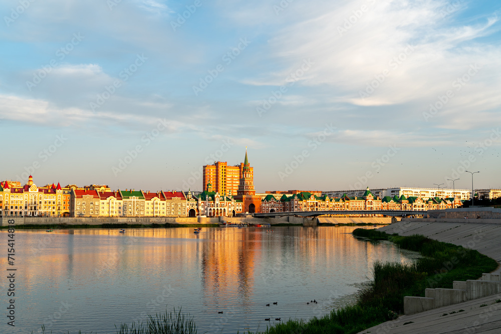 Yoshkar-Ola, Russia. Panorama of the city center. Malaya Kokshaga river, Bruges embankment, Theater bridge, Spasskaya tower