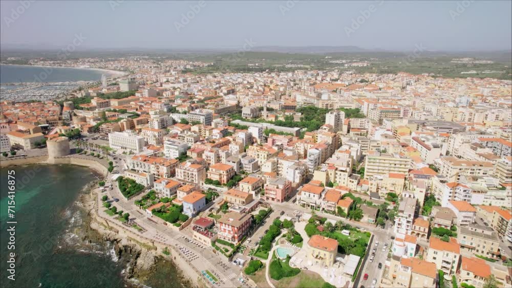 Captivating views of the sea surround a luxurious villa in Olbia, Sardinia, Italy, where tranquility meets modern elegance, captured by a soaring drone.