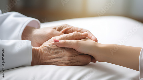 Arthritis person's hand in support of a geriatric doctor or nursing caregiver.