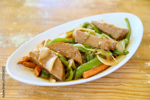 stir-fried vegetables with tofu and green beans, closeup of a dish