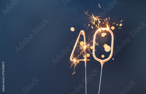 40 years celebration festive background made with Bengal fires in the form of number Forty. photo