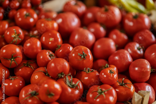 Image of lots of fresh organic tomatoes.