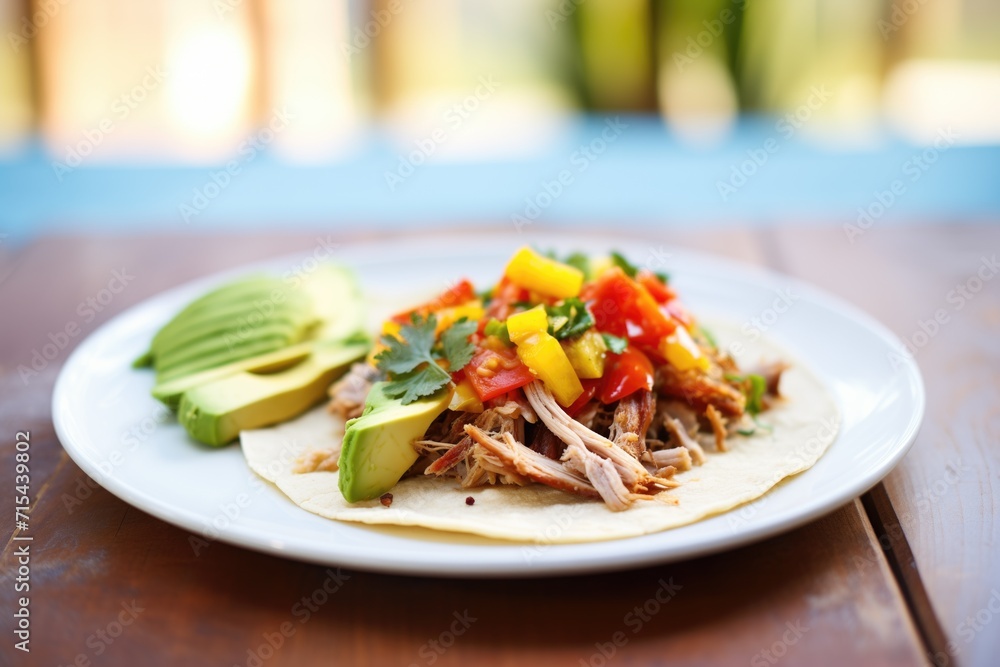 shredded pork carnitas in soft corn tortilla with avocado shredded pork carnitas in soft corn tortilla with avocado