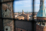 Cremona panorama of the cathedral bell tower from the Torrazzo tower at sunset