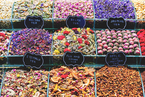 Herbal tee. Various sorts of tea and spices at Egypt Bazaar (Misir Carsisi) in Istanbul, Turkey (Turkiye). Selected focus, copy space, colorful set of spices photo