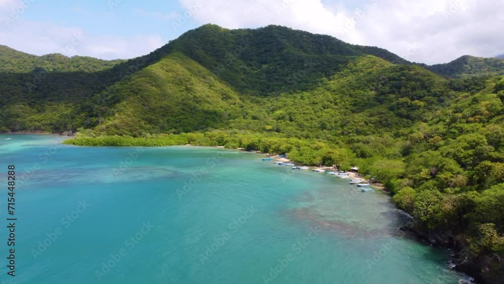 Aerial drone view of beach and jungle filled with vegetation in Tayrona National Park, Santa Marta Colombia Aerial drone view of beach and jungle filled with vegetation in Tayrona National Park, Santa Marta Colombia