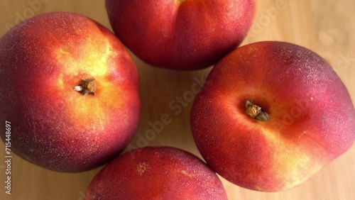 Freshly picked ripe peaches Rotating photo