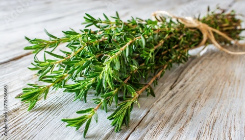 bundle of thyme on the white board horizontal