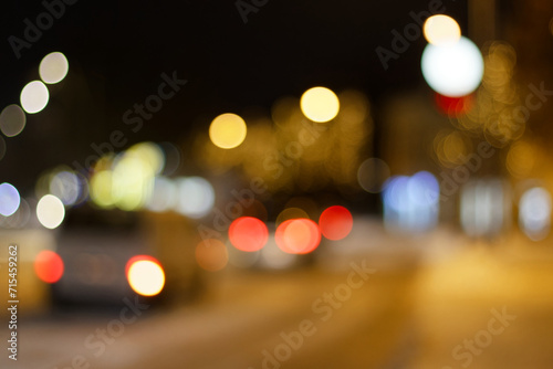 Night traffic at city centre, winter bokeh