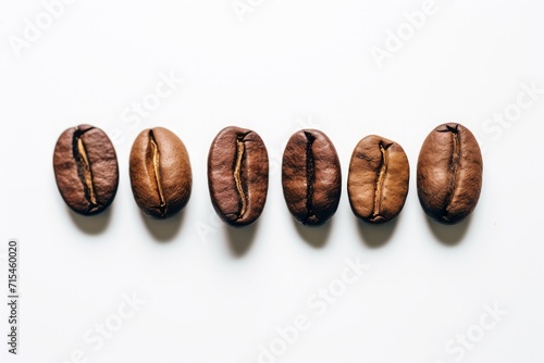 Top view of roasted coffee beans isolated on white background with copy space. Coffe beans with white space