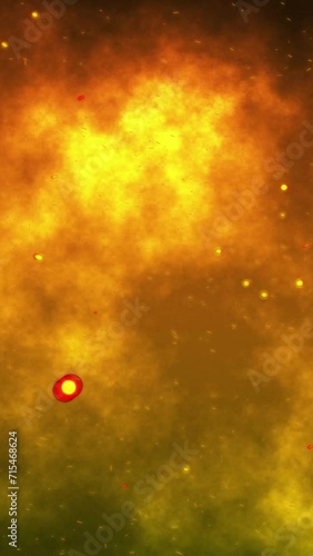Smoky cloud fire particles flow from bottom right to top left. Burning hot sparks rise from large fire. Abstract glowing orange yellow color background.