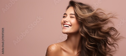 Happy young woman in formal attire looking away isolated on pastel background with copy space