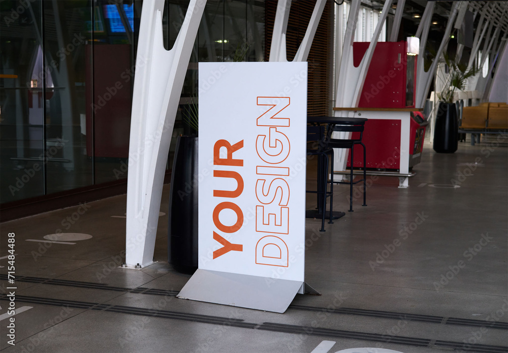 Mockup of customizable freestanding sign in building Stock Template