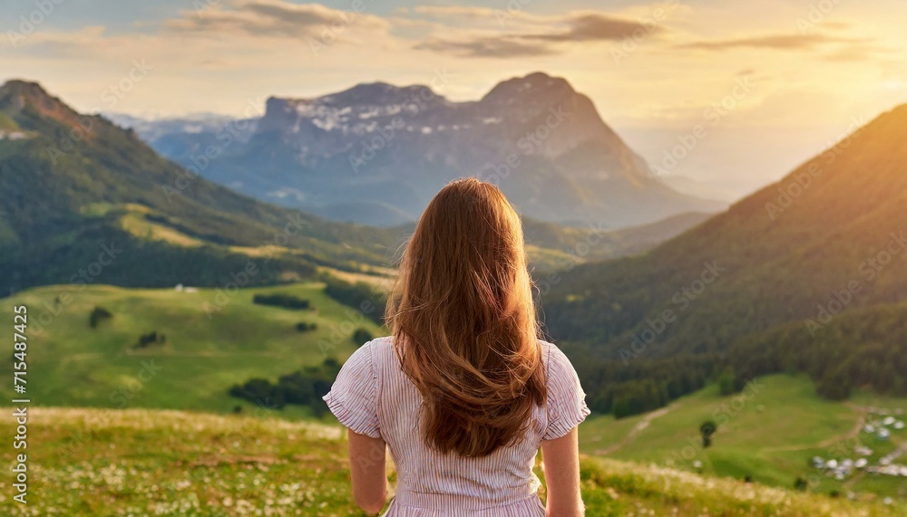 A woman enjoying the view of the mountains A woman enjoying the view of the mountains
