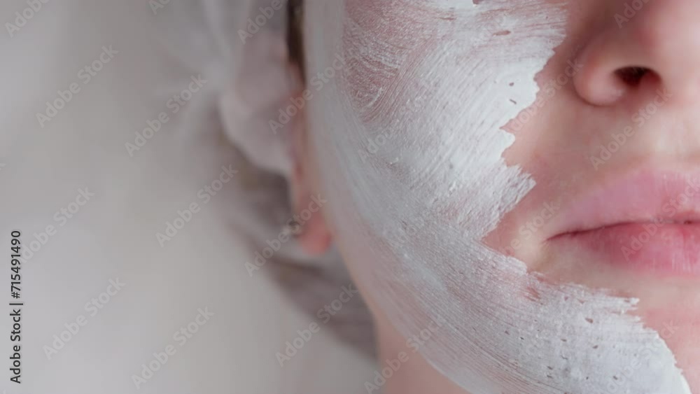 Applying Facial Peel Mask with Brush Close-up Applying Facial Peel Mask with Brush Close-up