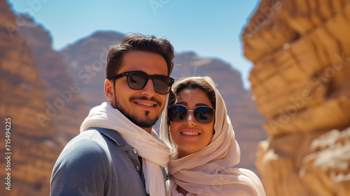 a handsome young Saudi couple having a great time on vacation in Al Ula