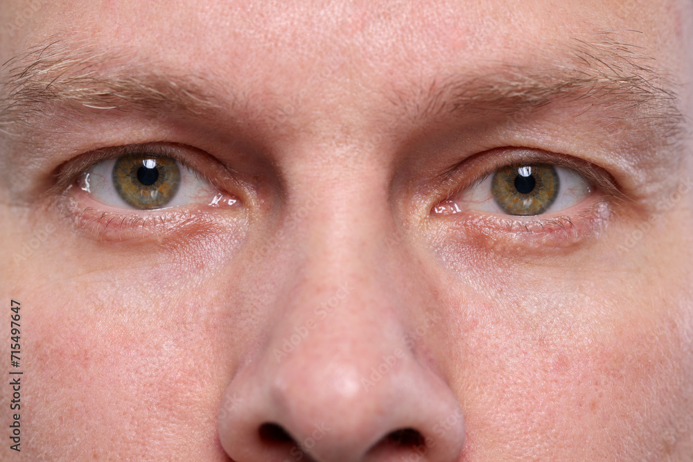 Closeup view of man with beautiful eyes Closeup view of man with beautiful eyes
