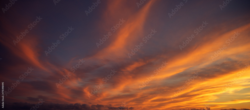Sunset sky with orange clouds. Nature background. - obrazy, fototapety, plakaty 