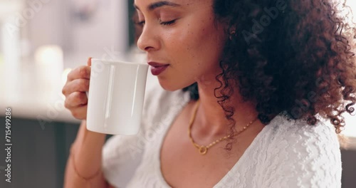 Woman, smell coffee and morning in home with steam, flavor and thinking with memory, vision or idea. African girl, tea cup and scent with latte, espresso or coco in house, apartment and remember photo