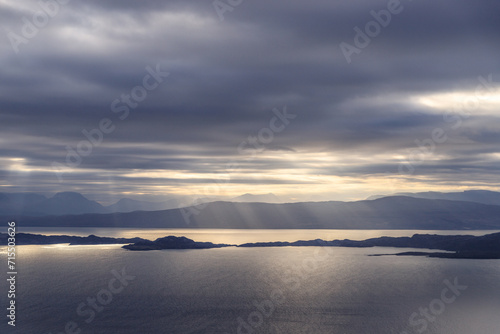 A Tranquil Dawn Over the Mountainous Seascape