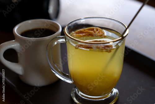 View of a tangerine tea with a coffee