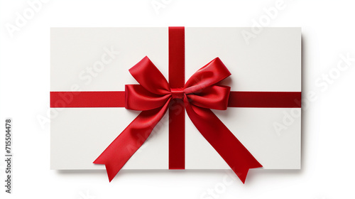 A white gift box with a vibrant red ribbon on a plain background, suitable for holidays and celebrations © Nataliia