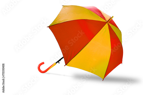 Stripe umbrellas Red and Yellow color with handle, isolated with clipping path selection on white background. Object or Rainy season concept.