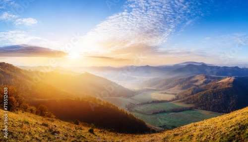 panoramic view of the sunrise in the mountains valley © Lucia