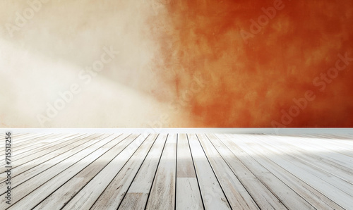 White wooden floor and an orange to beige colored wall