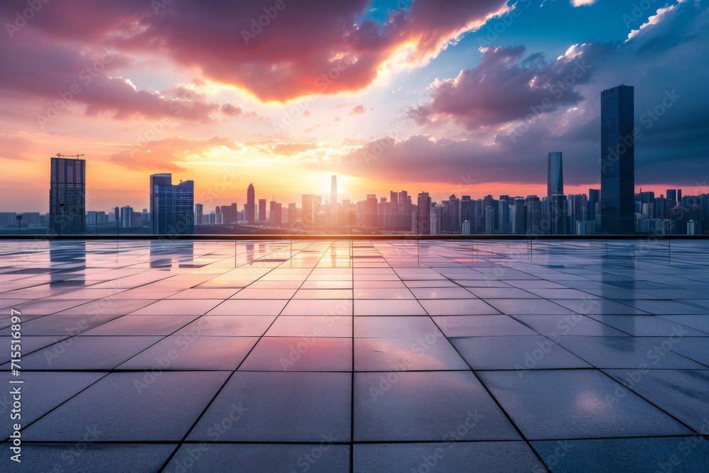 Empty square floors and city skyline with sky clouds at sunset