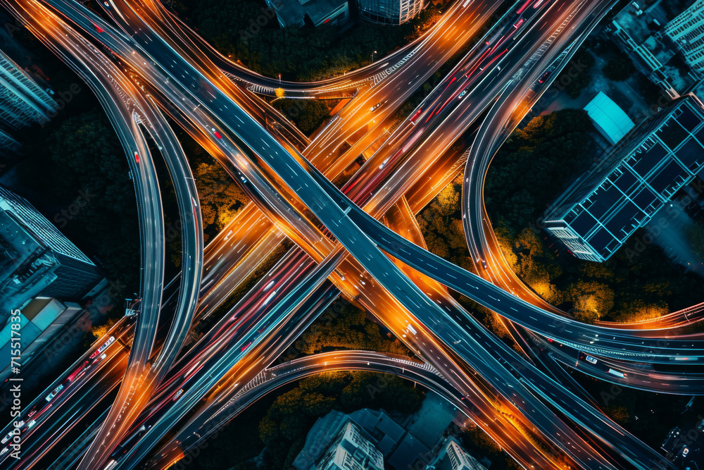 Top view of car traffic transport on crossing multiple lanes highway or expressway in Asia city at night. Top view of car traffic transport on crossing multiple lanes highway or expressway in Asia city at night.