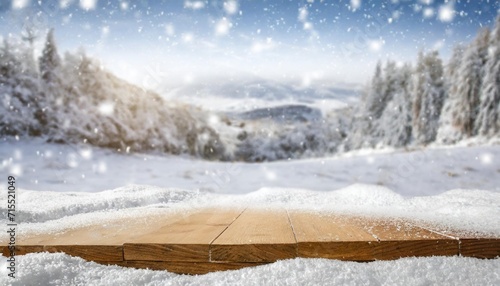 desk of free space cover of snow flakes and winter landscape © Marcelo
