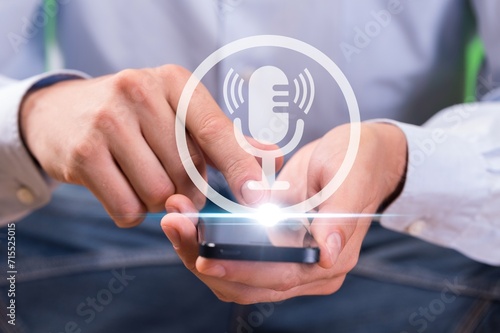 Wallpaper Mural Voice recording concept. Man touching smart phone. Torontodigital.ca