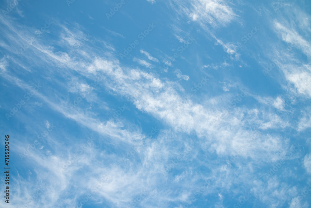 Blue sky background with beautiful white cloud in sunny day summer season. Nature and save environmental concept.